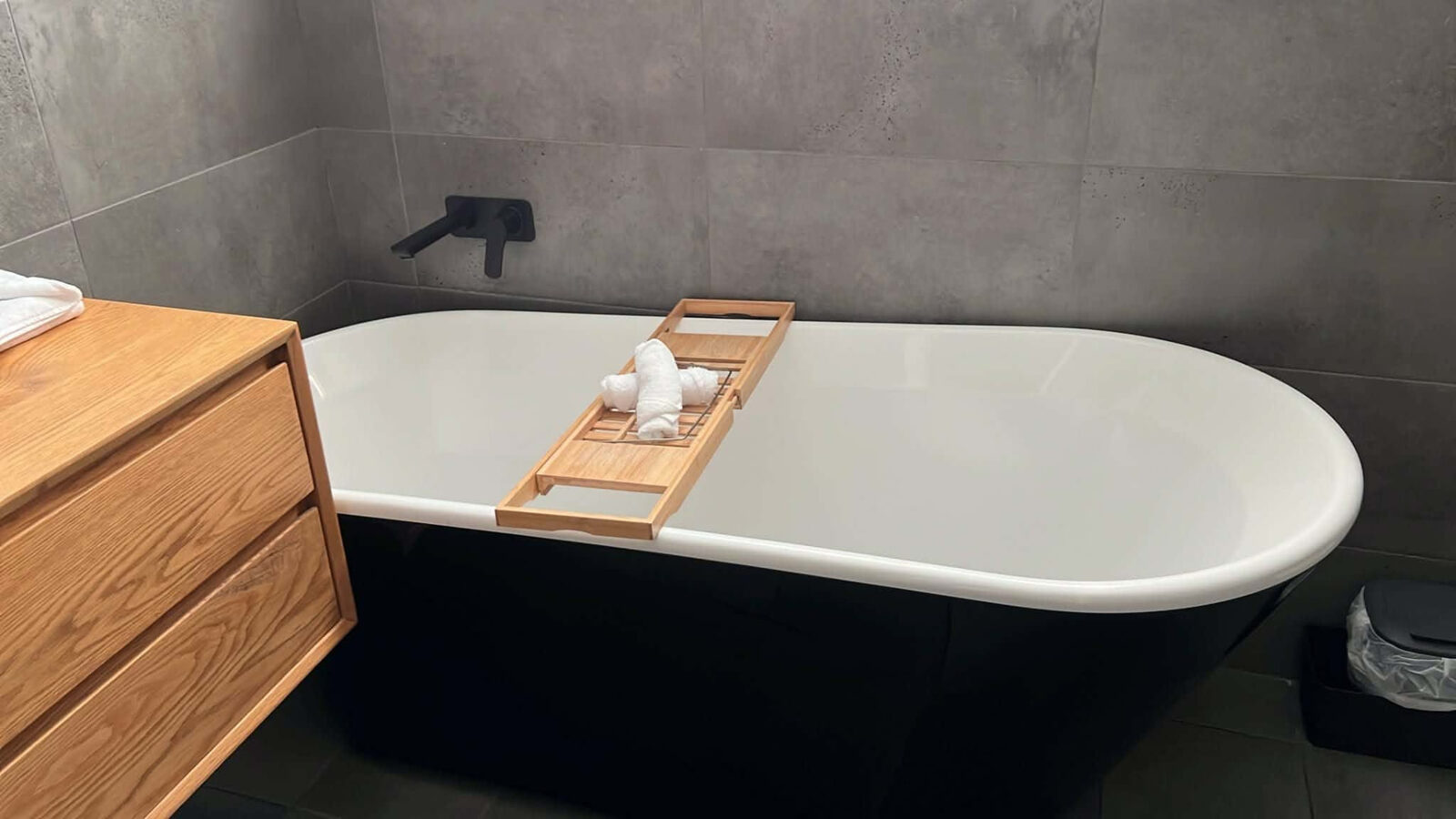 Freestanding bath cleaned and styled for guest arrival