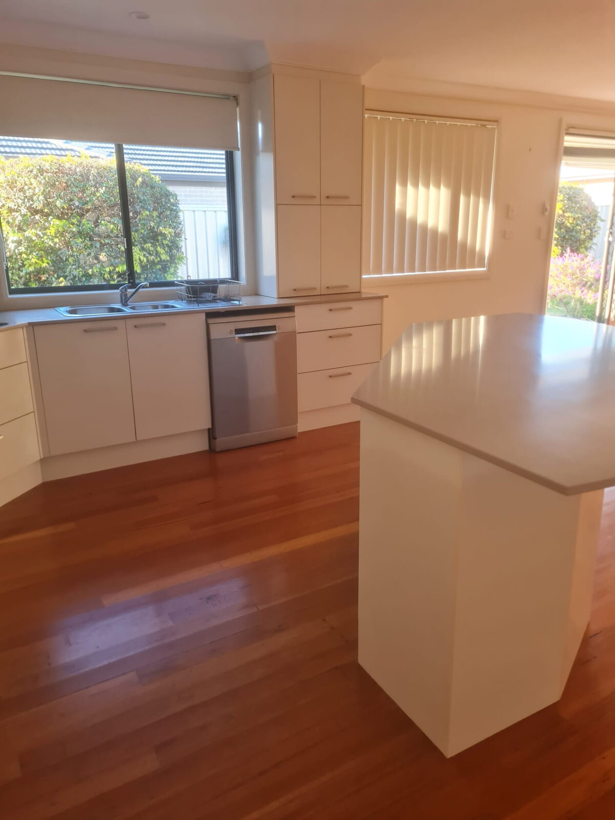 Kitchen and island bench cleaned for end of lease inspection