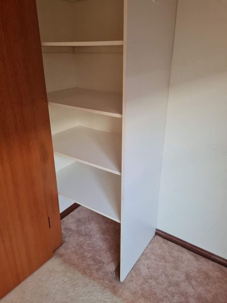 Built in wardrobe shelving wiped out ready for the new owners