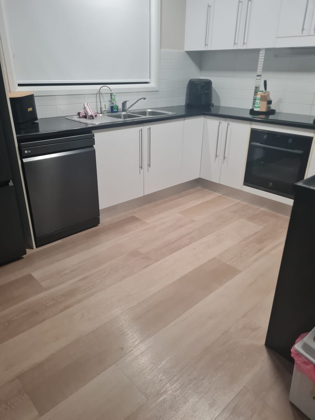 Kitchen cleaned and floors mopped after a guest turnover