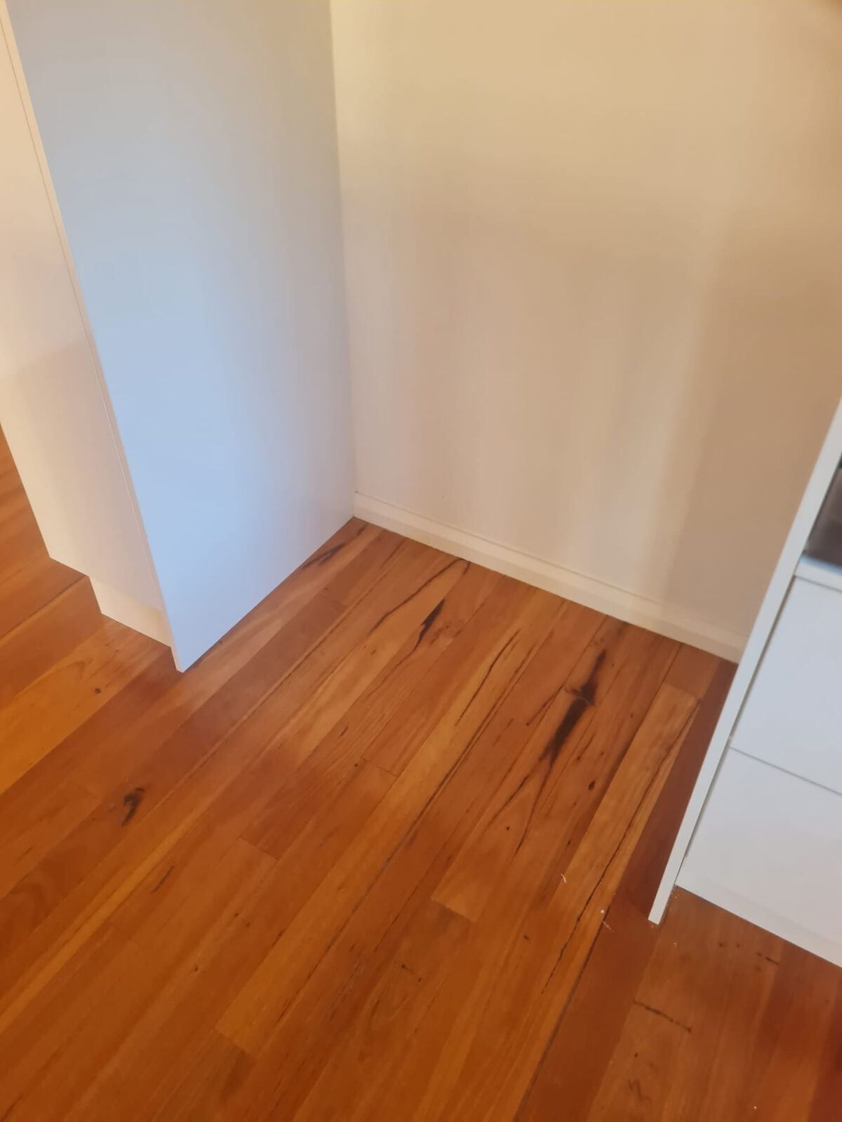 Skirting boards and timber floors detailed after a vacate clean