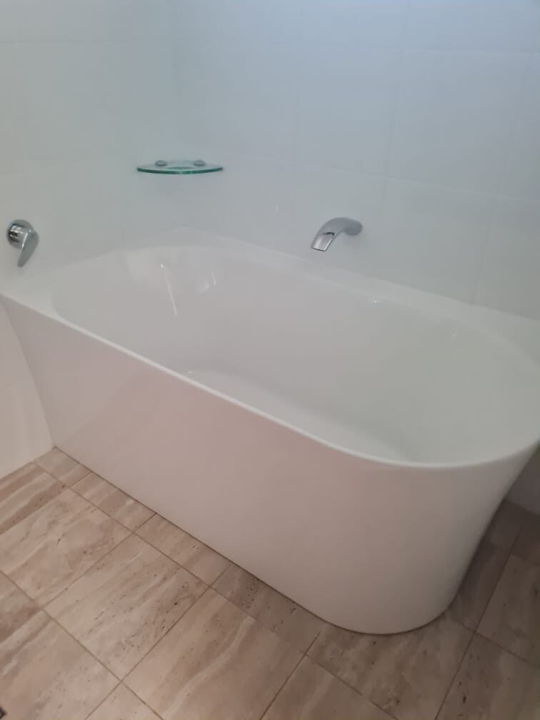 Freestanding bath and tiles cleaned before the new owners move in