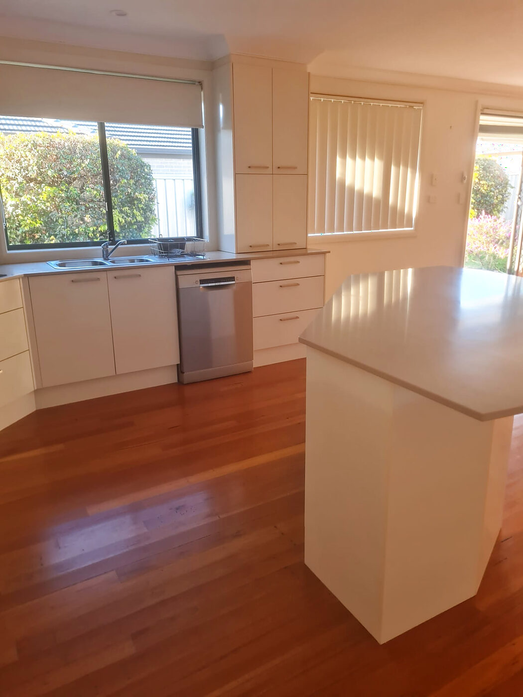 Spotless white kitchen cleaned to a five star standard in a Mid North Coast holiday home
